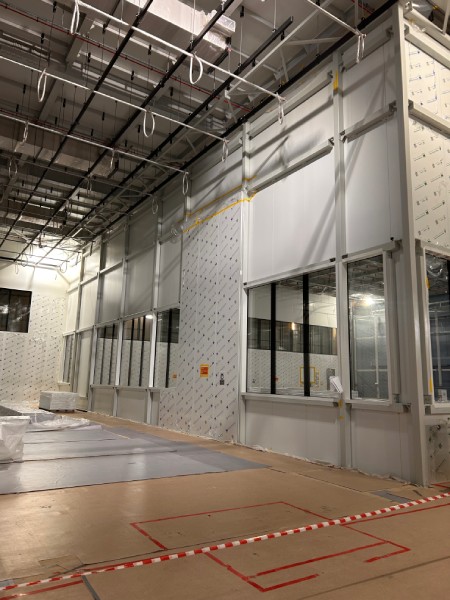 Wonclean Russia FAB 300 cleanroom project photo showing high wall panels, observation windows and overhead HVAC coordination